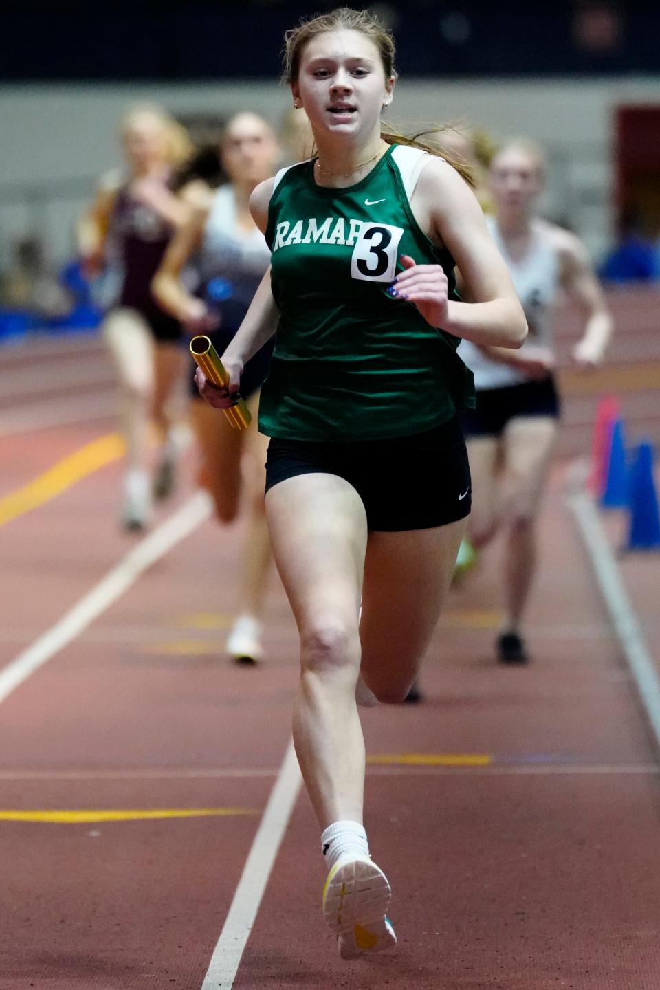 Bridget Cannon, of Ramapo, is in the lead during the first leg of the 4x800, Monday, January 22, 2024.