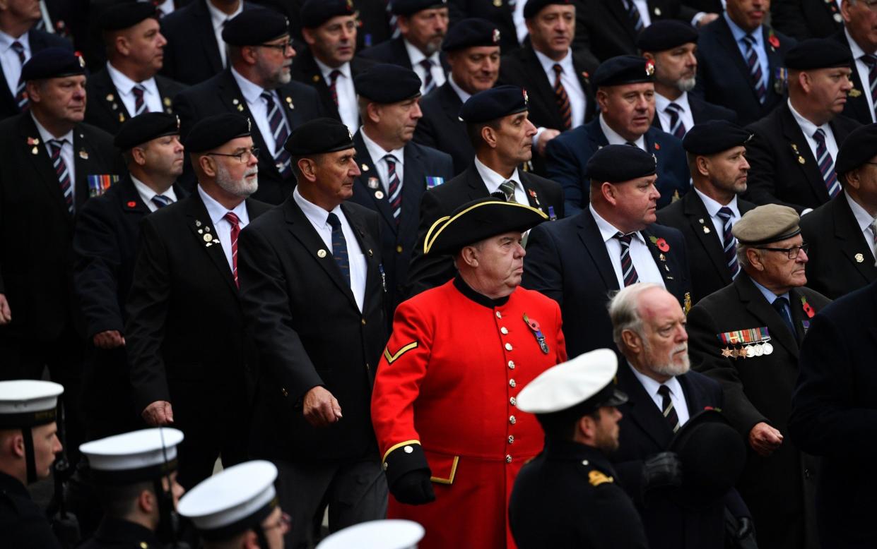 Veterans march along Whitehall during the Remembrance Sunday ceremony - Getty Images Europe 