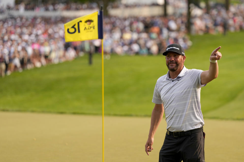 Michael Block acknowledges the crowd on the 18th hole after his final round of the PGA Championship golf tournament at Oak Hill Country Club on Sunday, May 21, 2023, in Pittsford, N.Y. (AP Photo/Seth Wenig)