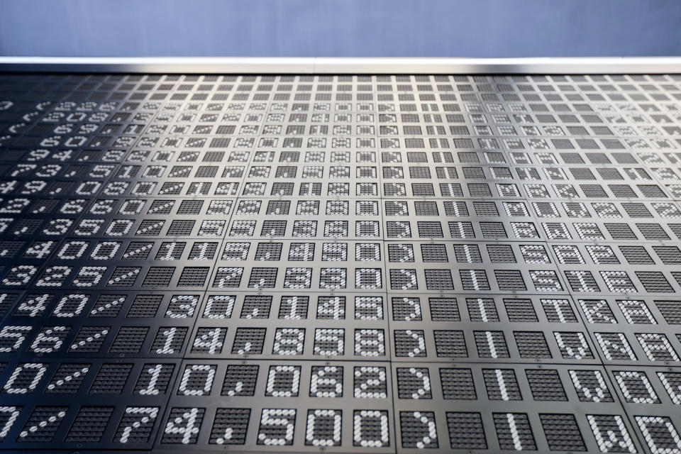 Stock price figures sit on display inside the Frankfurt Stock Exchange, operated by Deutsche Boerse AG, in Frankfurt. Photo|: Alex Kraus/Bloomberg/Getty