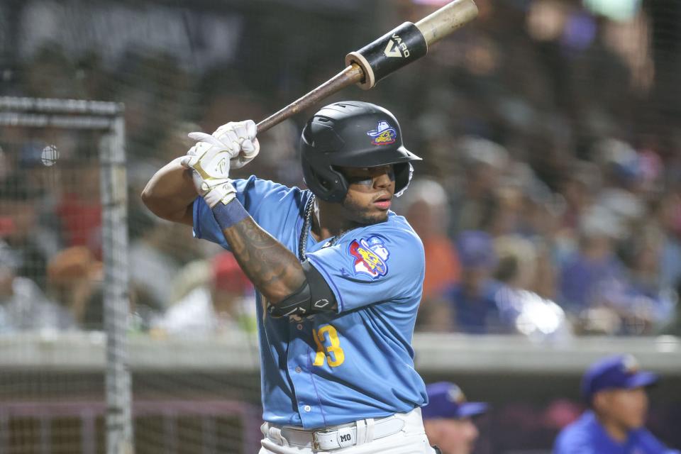 Amarillo Sod Poodles’ Deyvison De Los Santos (13) watches a pitch from the batter’s circle in a Texas League Championship game against the Arkansas Travelers on Sept. 27, 2023, in Amarillo, Texas.