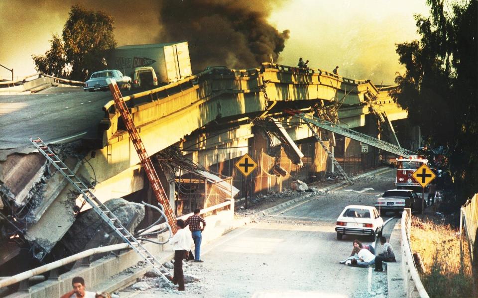 The 6.9 magnitude Loma Prieta earthquake in 1989 caused widespread damage around the Bay Area and dozens of deaths. <a href="https://www.gettyimages.com/detail/news-photo/oakland-ca-october-17-1989-two-people-lower-right-comfort-news-photo/1172229915" rel="nofollow noopener" target="_blank" data-ylk="slk:Paul Miller/MediaNews Group/Oakland Tribune via Getty Images;elm:context_link;itc:0;sec:content-canvas" class="link ">Paul Miller/MediaNews Group/Oakland Tribune via Getty Images</a>