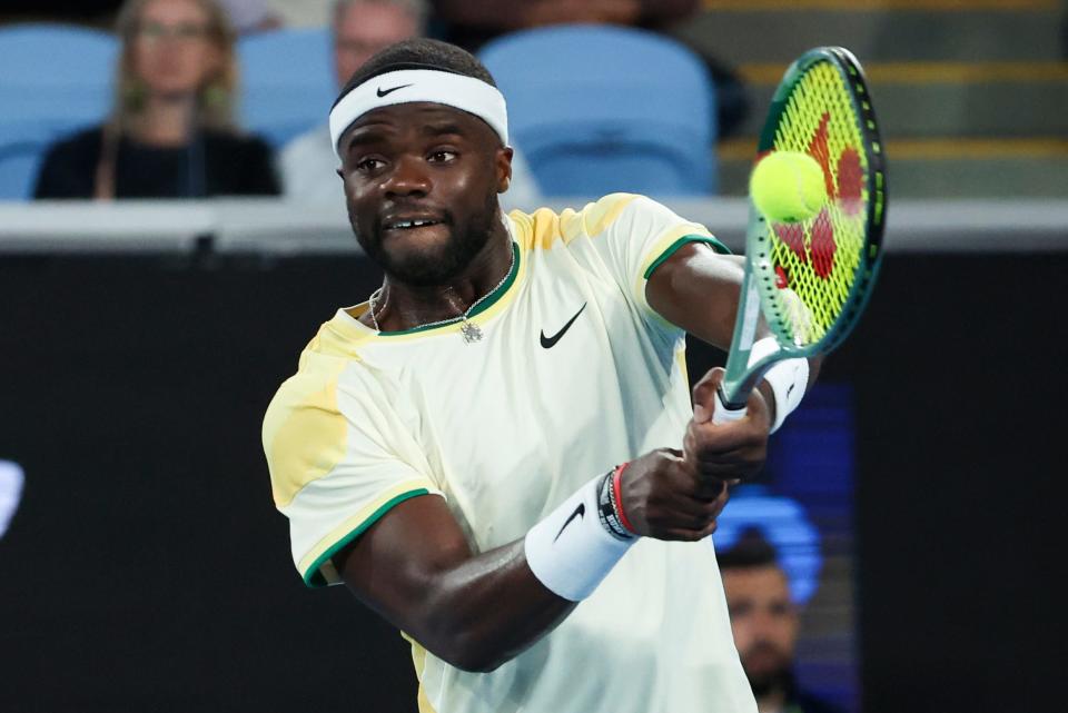 Jan. 14: Frances Tiafoe of the U.S. plays a backhand return to Borna Coric of Croatia during their first round match at the Australian Open.