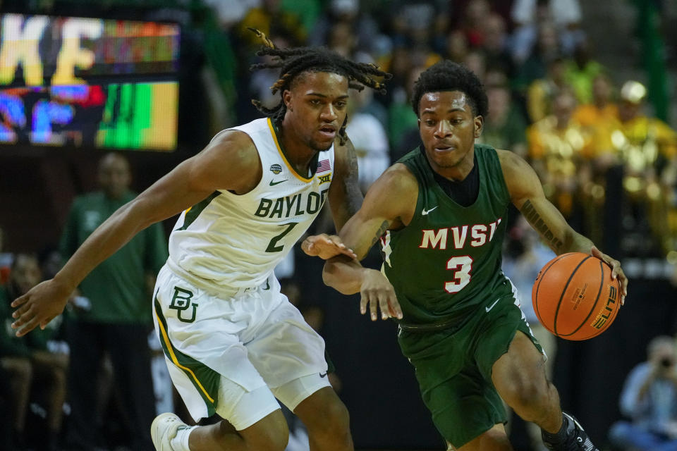 Mississippi Valley State guard Donovan Sanders (3) drives against Baylor guard Jayden Nunn (2) during the first half of an NCAA college basketball game, Friday, Dec. 22, 2023, in Waco, Texas. (AP Photo/Julio Cortez)