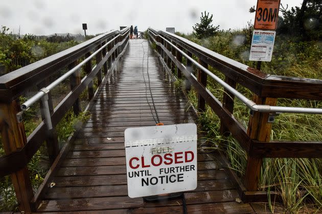 A sign announces a beach closure on August 22, 2021, in Montauk, New York.