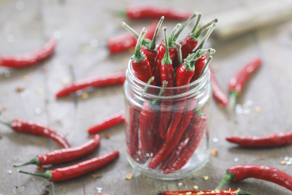 Heat from spicy chillies can help stimulate the release of happy chemicals in the body. (Getty Images)