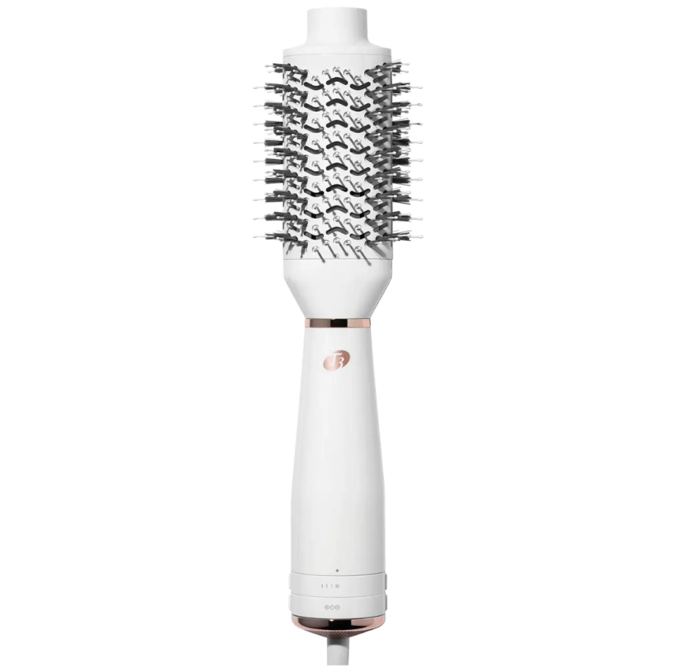 <p><a href="https://go.redirectingat.com?id=74968X1596630&url=https%3A%2F%2Fwww.sephora.com%2Fproduct%2Ft3-airebrush-one-step-smoothing-volumizing-blow-dry-brush-P508144&sref=https%3A%2F%2F" rel="nofollow noopener" target="_blank" data-ylk="slk:Shop Now;elm:context_link;itc:0;sec:content-canvas" class="link ">Shop Now</a></p><p>AireBrush One-Step Smoothing and Volumizing Hair Dryer Brush</p><p>$112.49</p><span class="copyright">Sephora</span>