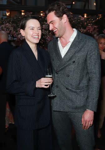 <p>Dave Benett/Getty</p> Daisy Ridley and Tom Bateman attend a Filmmaker's Dinner on May 11, 2023 in London, England.