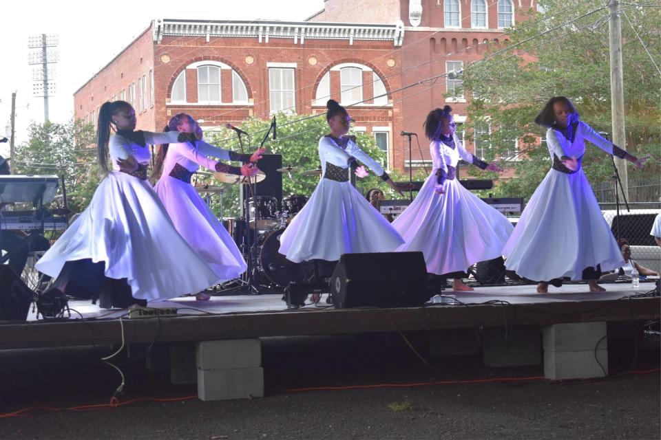 Dancers perform during The Outpouring in 2019.