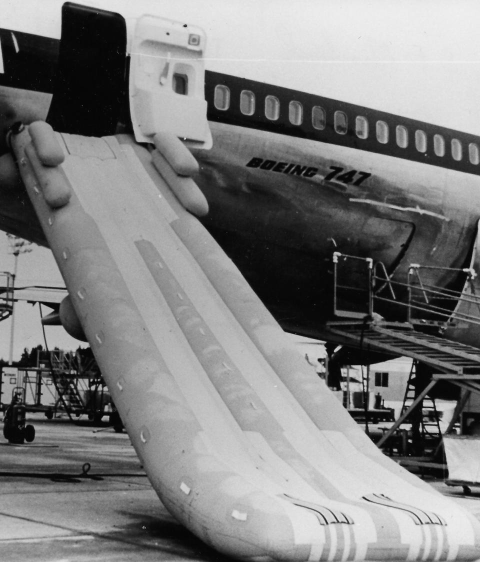 A B.F. Goodrich escape slide descends in 1978 from an emergency exit of an American Airlines 747 from Boeing.