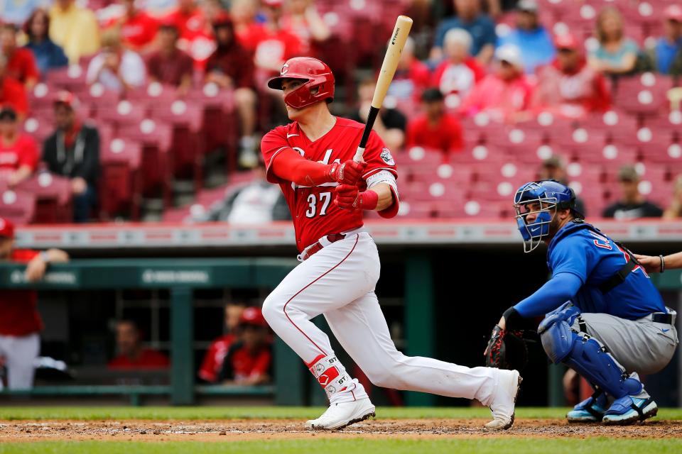 Cincinnati Reds catcher Tyler Stephenson (37) takes off on a go-ahead RBI single in the third inning of the MLB National League game between the Cincinnati Reds and the Chicago Cubs at Great American Ball Park in downtown Cincinnati on Thursday, May 26, 2022. The Reds led 10-3 after three innings. 