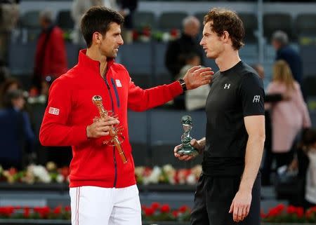 Tennis - Madrid Open - Men's Finals - Novak Djokovic of Serbia v Andy Murray of Britain - Madrid, Spain - 8/5/16 Djokovic and Murray talk during the trophy ceremony. REUTERS/Paul Hanna