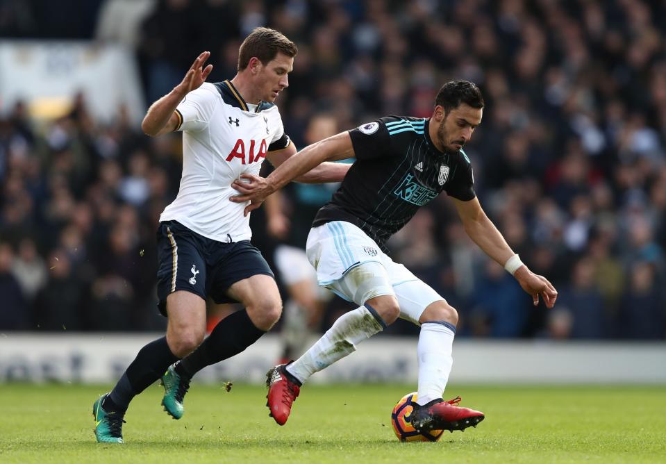 <p>Jan Vertonghen of Tottenham Hotspur (L) puts pressure on Nacer Chadli of West Bromwich Albion </p>