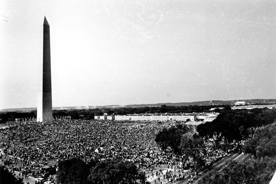 In this Aug. 28, 1963, file photo shows civil rights demonstrators gather at the Washington Monument grounds before noon, before marching to the Lincoln Memorial, seen in the far background at right, where the March on Washington for Jobs and Freedom will end with a speech by Rev. Martin Luther King Jr., now known as the "I Have A Dream" speech. 