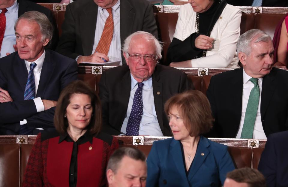 Sen. Bernie Sanders, center