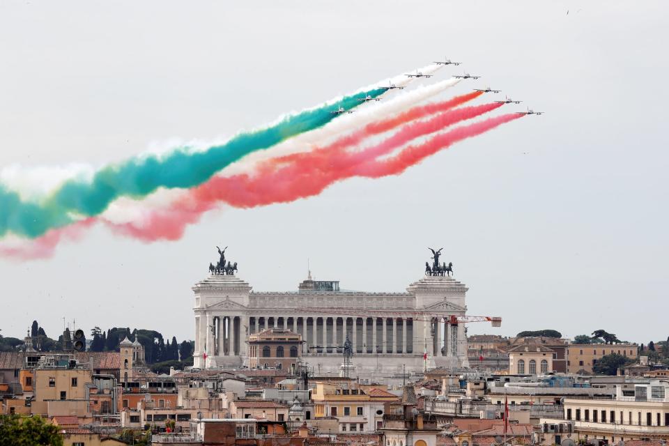 The aerobatic demonstration team of the Italian Air Force, the Frecce Tricolori (Tricolor Arrows), perform over the city on Republic Day, in Rome, Italy, in June 2021.