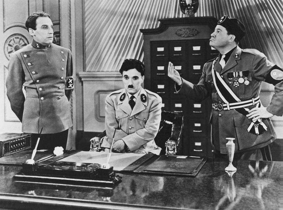 THE GREAT DICTATOR, from left: Henry Daniell, Charlie Chaplin, Jack Oakie, 1940.