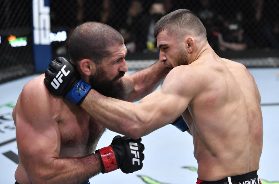 LAS VEGAS, NEVADA - JANUARY 15: (L-R) Court McGee and Ramiz Brahimaj trade punches in their welterweight fight during the UFC Fight Night event at UFC APEX on January 15, 2022 in Las Vegas, Nevada. (Photo by Jeff Bottari/Zuffa LLC via Getty Images)