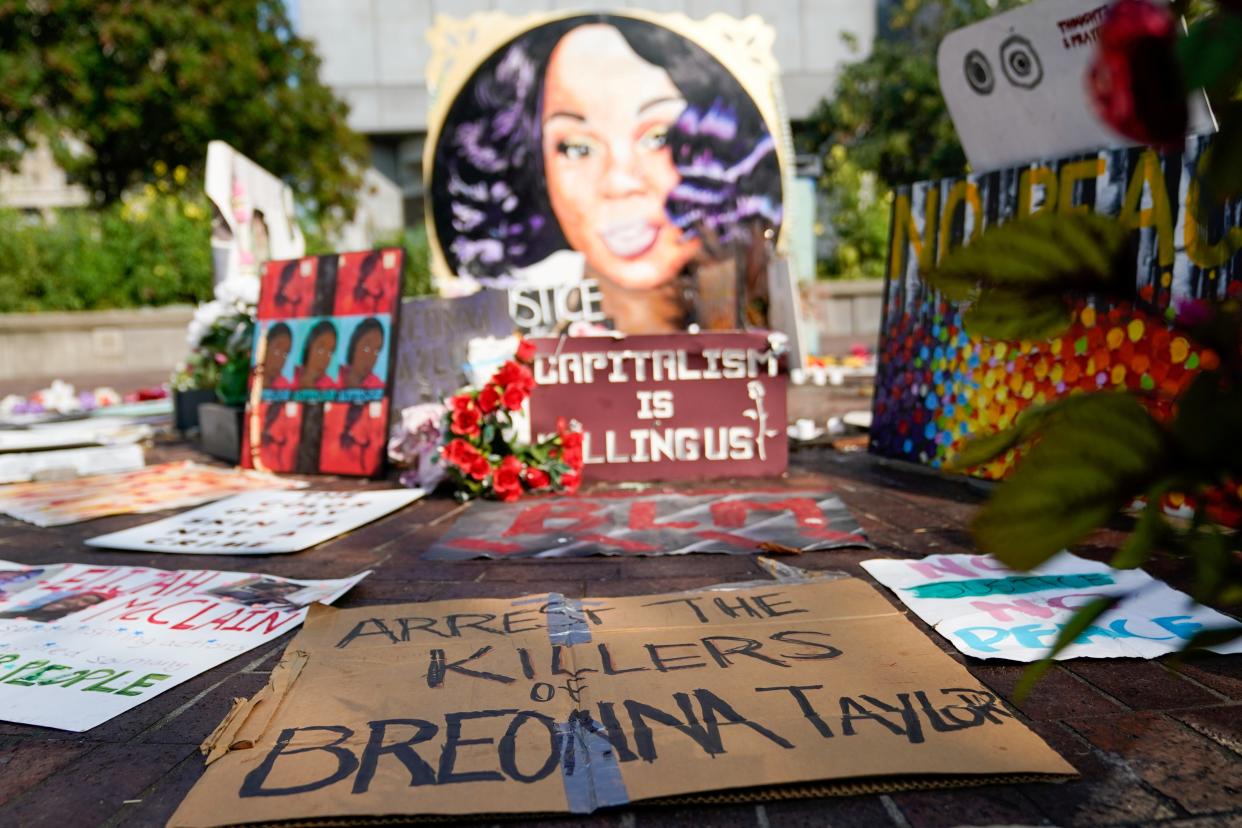 Signs used during protests and rallies are displayed at a memorial for Breonna Taylor in Louisville, Kentucky. (REUTERS)