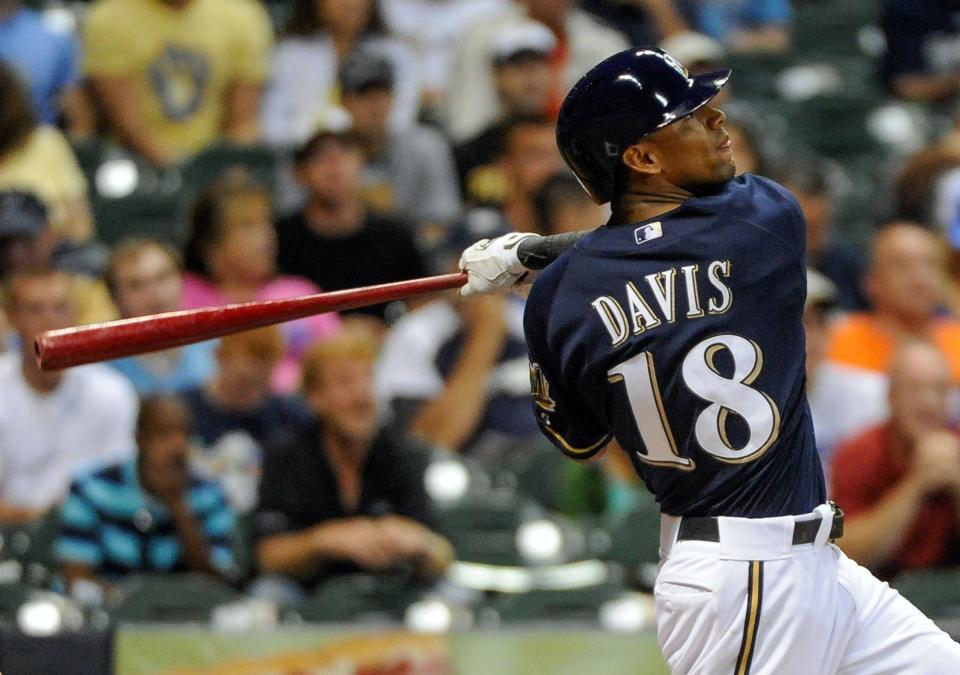 Milwaukee Brewers left fielder Khris Davis hits a two-run home run against Pittsburgh in 2013.