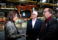 General Motors Chief Executive Officer Mary Barra talks with United Auto Workers union Vice President Terry Dittes and UAW Region 1 Director Frank Stuglin at the GM Orion Assembly Plant in Lake Orion, Michigan, U.S. March 22, 2019. REUTERS/Rebecca Cook