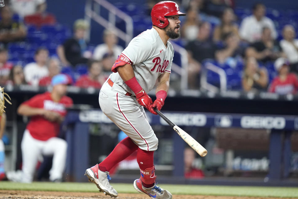 Philadelphia Phillies' Kyle Schwarber watches his solo home run during the eighth inning of the team's baseball game against the Miami Marlins, Saturday, July 16, 2022, in Miami. The Phillies won 10-0. (AP Photo/Lynne Sladky)
