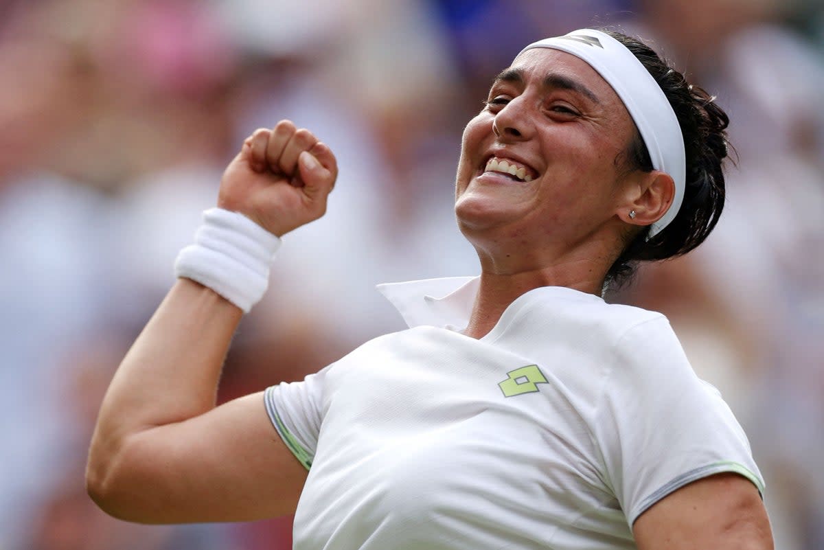 Joy: Jabeur beat Petra Kvitova on Monday  (AFP via Getty Images)