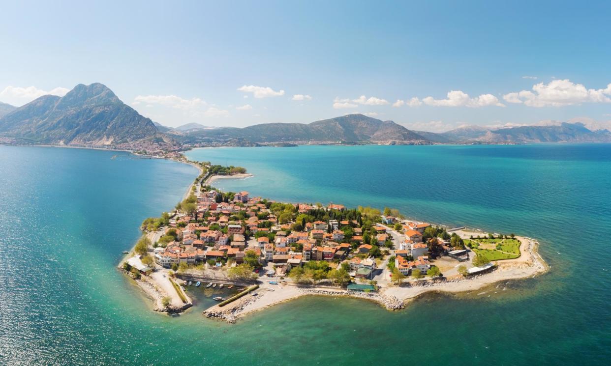 <span>Eğirdir town and Yeşilada on the southern edge of Eğirdir lake.</span><span>Photograph: Tunart/Getty Images</span>