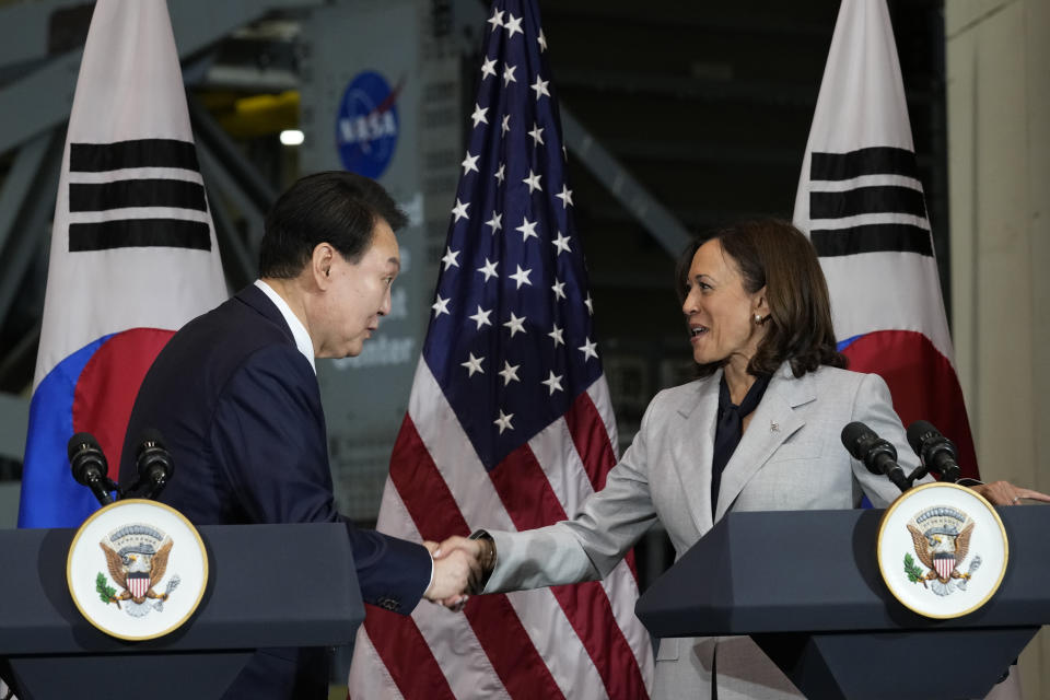 Vice President Kamala Harris and South Korea's President Yoon Suk Yeol shake hands during a visit to NASA's Goddard Space Flight Center in Greenbelt, Md., Tuesday, April 25, 2023. (AP Photo/Susan Walsh)
