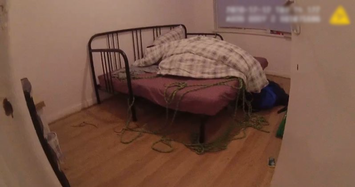 A bedroom at the Cardiff flat where one of the victims was tortured (Crown Prosecution Service )