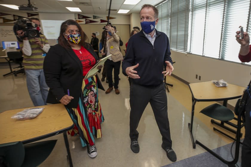 Superintendent Austin Beutner, right, and UTLA President Cecily Myart-Cruz