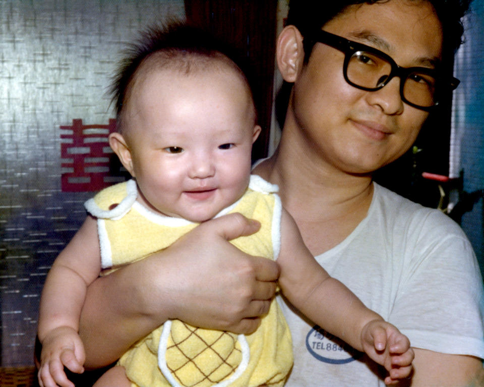 Nancy Wang Yuen as a baby, pictured with her father. (Courtesy Nancy Yuen)