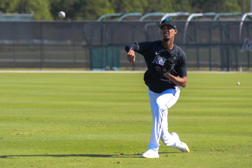 Miami Marlins right-handed pitcher Eury Perez plays catch during a workout at the Roger Dean Chevrolet Stadium complex in Jupiter, Florida, on Wednesday, Feb. 15, 2022.