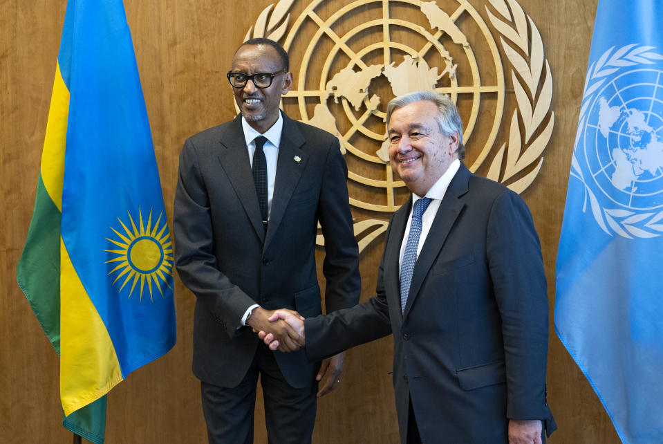 Rwanda's President Paul Kagame, left, is greeted by United Nations Secretary-General Antonio Guterres, Monday, Sept. 24, 2018, at U.N. headquarters. (AP Photo/Craig Ruttle)