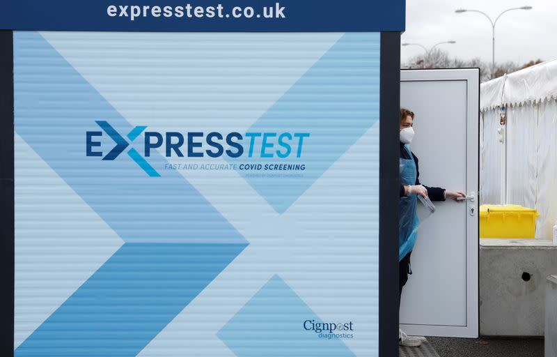 A staff member is seen at the Express Test COVID-19 testing facility at Gatwick airport, amid the coronavirus disease (COVID-19) outbreak, in Crawley