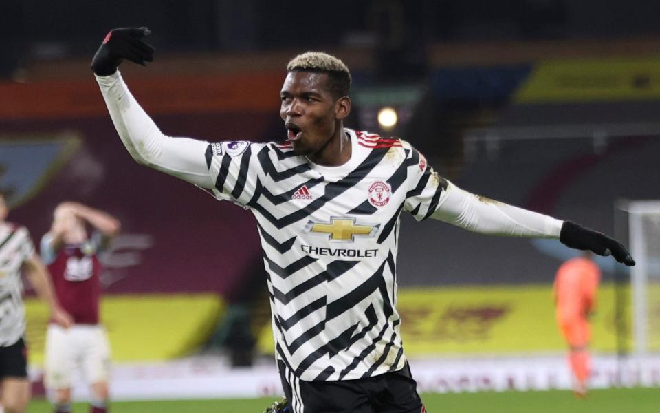 Manchester United's Paul Pogba celebrates after scoring during the English Premier League soccer match between Burnley and Manchester United in Burnley, - AP