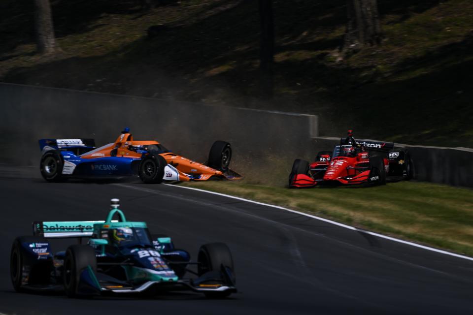 <em>Will Power hits the Turn 12 wall after colliding with Scott Dixon in practice at Road America (James Black/Penske Entertainment).</em>