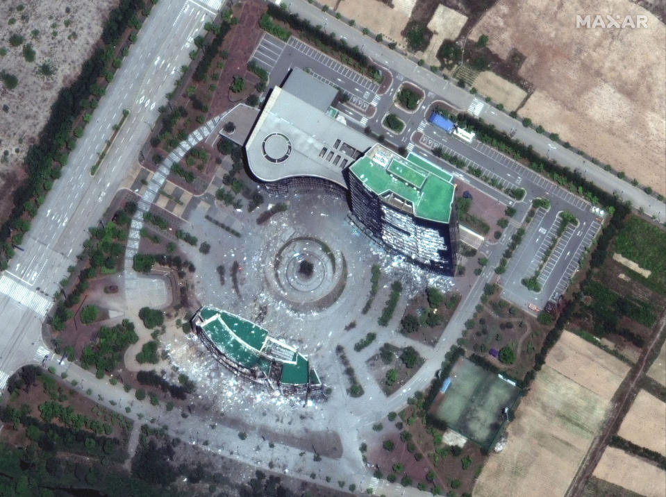 This June 22, 2020, satellite image provided by Maxar Technologies shows an inter-Korean liaison office building after being blown up at a shuttered joint industrial park in Kaesong, North Korea. The North blew up the liaison office building just north of the heavily armed border with South Korea on June 16, 2020 in a carefully choreographed, largely symbolic display of anger. (Maxar Technologies via AP)