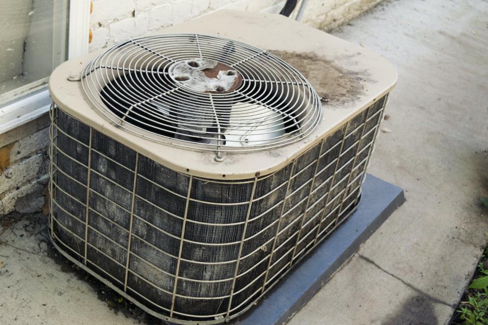 Rental homes often have older air conditioning units that are less efficient. <a href="https://www.gettyimages.com/detail/photo/old-air-conditioner-unit-in-need-of-updating-royalty-free-image/542190768" rel="nofollow noopener" target="_blank" data-ylk="slk:SBSArtDept via Getty Images;elm:context_link;itc:0;sec:content-canvas" class="link ">SBSArtDept via Getty Images</a>