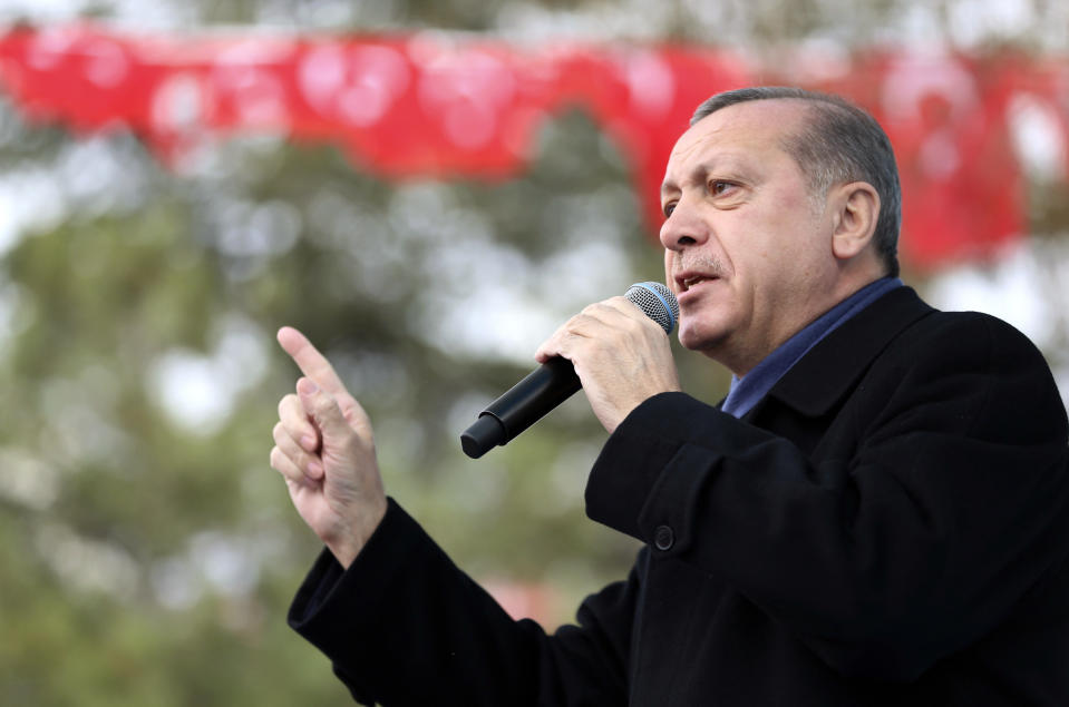 Turkey's President Recep Tayyip Erdogan addresses his supporters in Eskisehir, Turkey Friday, March 17, 2017. Erdogan has called on Turks living in Europe to have at least five children, saying it would be the best response to European's "injustices." Erdogan made the comments Friday while campaigning in the city of Eskisehir for a referendum that would usher in a presidential system and enhance his powers. (Murat Cetinmuhurdar/Presidential Press Service, Pool Photo via AP)