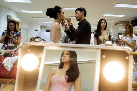 Contestants prepare backstage before the final show of the Miss International Queen 2016 transgender/transsexual beauty pageant in Pattaya, Thailand, March 10, 2017. REUTERS/Athit Perawongmetha