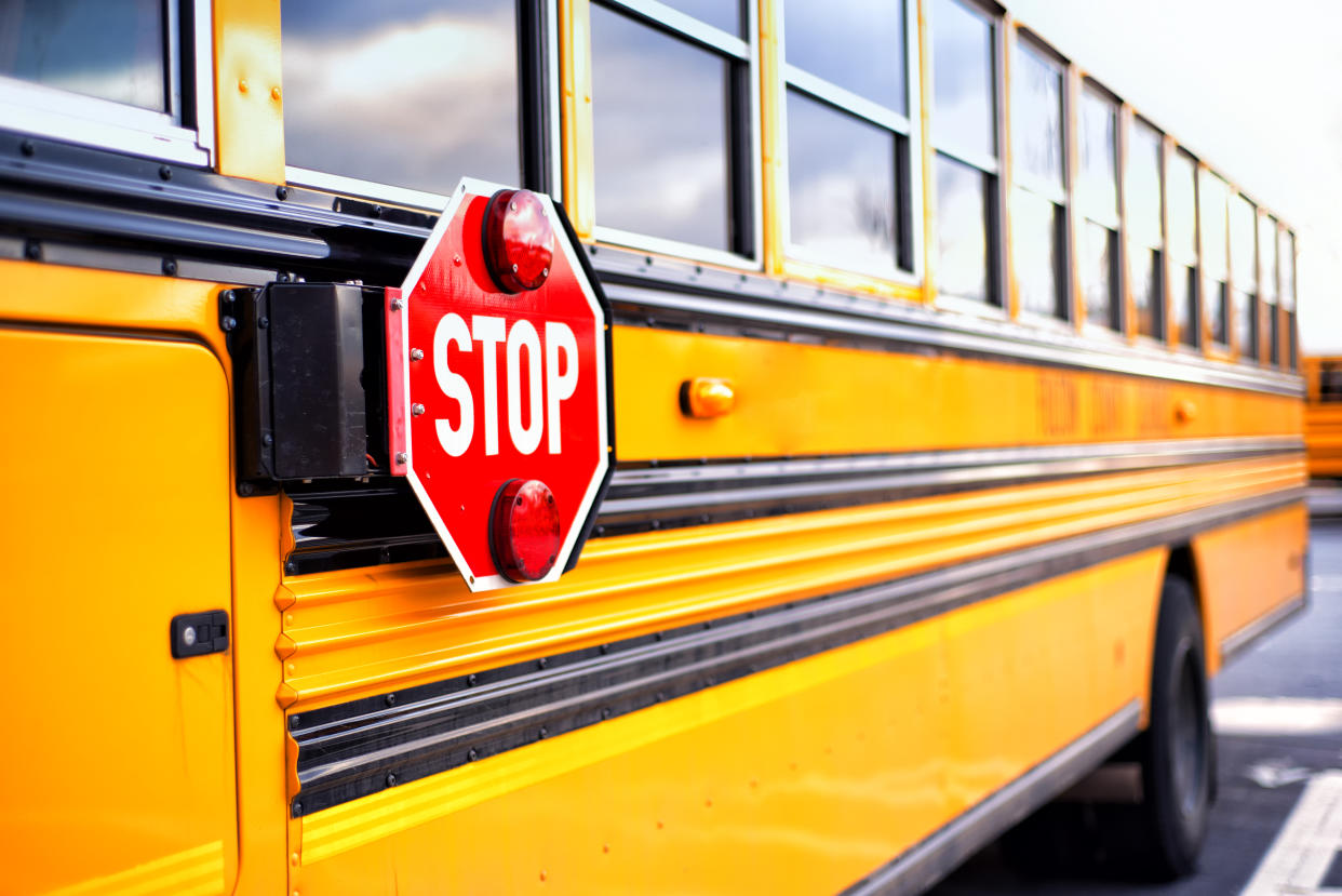 A mother greeted her son at the bus stop carrying an assault rifle after he claimed he was bullied. (Photo: Getty Images)