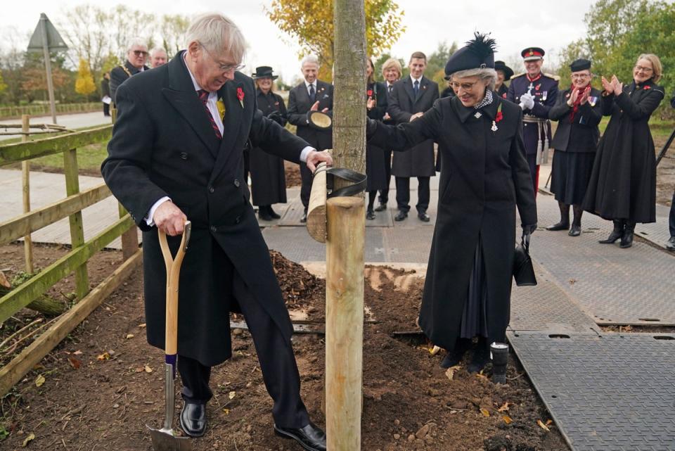The Duke and Duchess of Gloucester plant the last of 27 new Elm, Oak and Lime trees along the avenue leading to the entrance of the National Memorial Arboretum, Alrewas (PA)