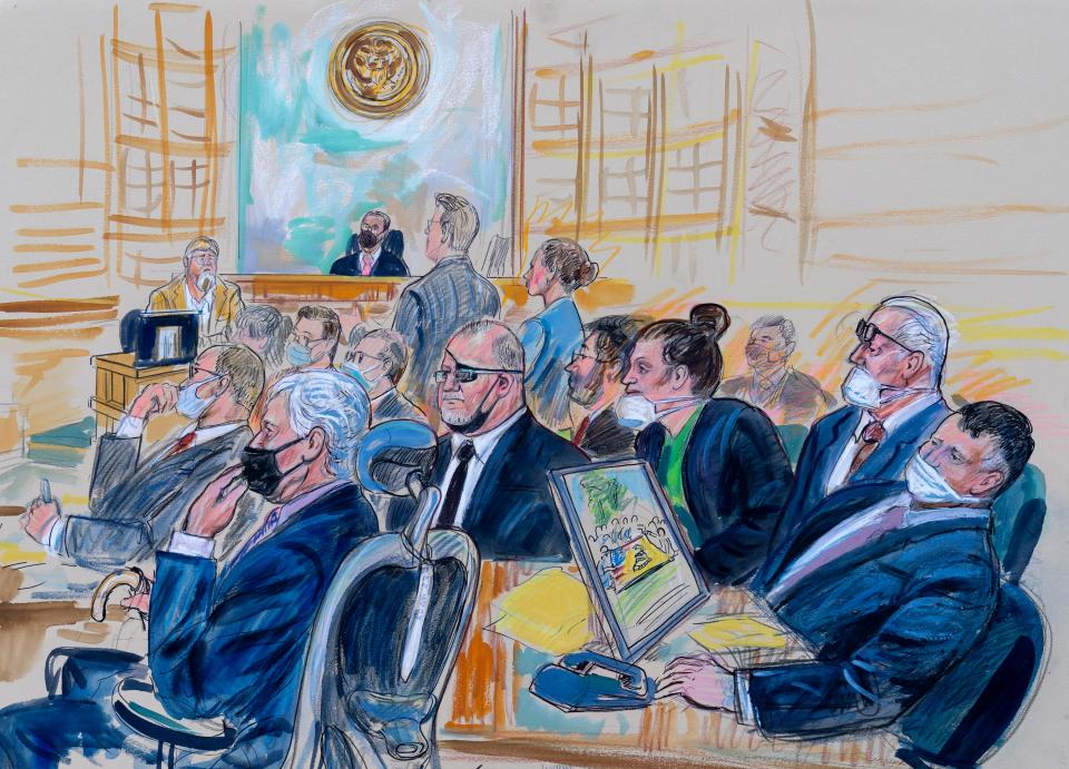 This artist sketch depicts the trial of Oath Keepers leader Stewart Rhodes and four others charged with seditious conspiracy in the Jan. 6, 2021, Capitol attack, in Washington, Thursday, Oct. 6, 2022. Shown above are, witness John Zimmerman, who was part of the Oath Keepersâ€™ North Carolina Chapter, seated in the witness stand, defendant Thomas Caldwell, of Berryville, Va., seated front row left, Oath Keepers leader Stewart Rhodes, seated second left with an eye patch, defendant Jessica Watkins, of Woodstock, Ohio, seated third from right, Kelly Meggs, of Dunnellon, Fla., seated second from right, and defendant Kenneth Harrelson, of Titusville, Fla., seated at right.