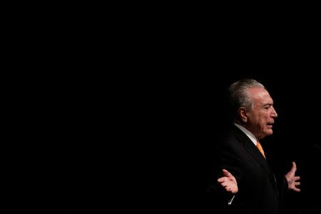 Brazil's President Michel Temer gestures during opening ceremony of the 20th conference of the march in defense of the municipalities, in Brasilia, Brazil May 16, 2017. REUTERS/Ueslei Marcelino