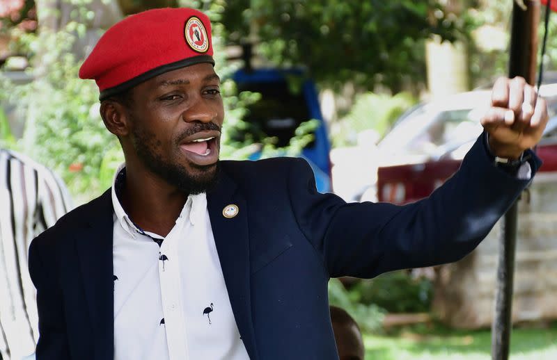 FILE PHOTO: Ugandan opposition leader and singer Robert Kyagulanyi Ssentamu, known as Bobi Wine addresses a news conference in Kampala