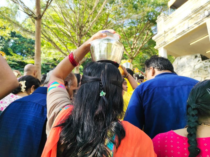 People carry milk on their heads during the Thaipusam festival in Penang. The symbolic vessels are offerings to bathe the deity in a cascade of milk — an act believed to purify believers. Genevieve Tan Shu Thung/dpa