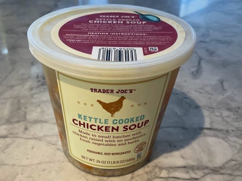 container of trader joes kettle cooked chicken noodle soup on a kitchen counter