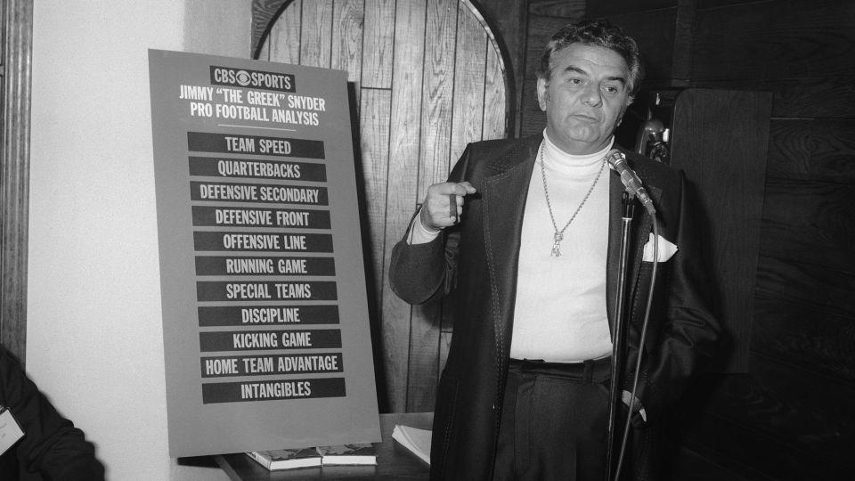 Jimmy "The Greek" Snyder meets the press in New York in 1976 to explain how he'll analyze football games for CBS on "The NFL Today." - Bettmann/Getty Images