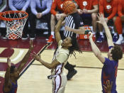 Florida State guard Caleb Mills goes for a layup off of a steal as Clemson forward/center Ben Middlebrooks defends in the first half of an NCAA college basketball game in Tallahassee, Fla., Saturday, Jan. 28, 2023. (AP Photo/Phil Sears)